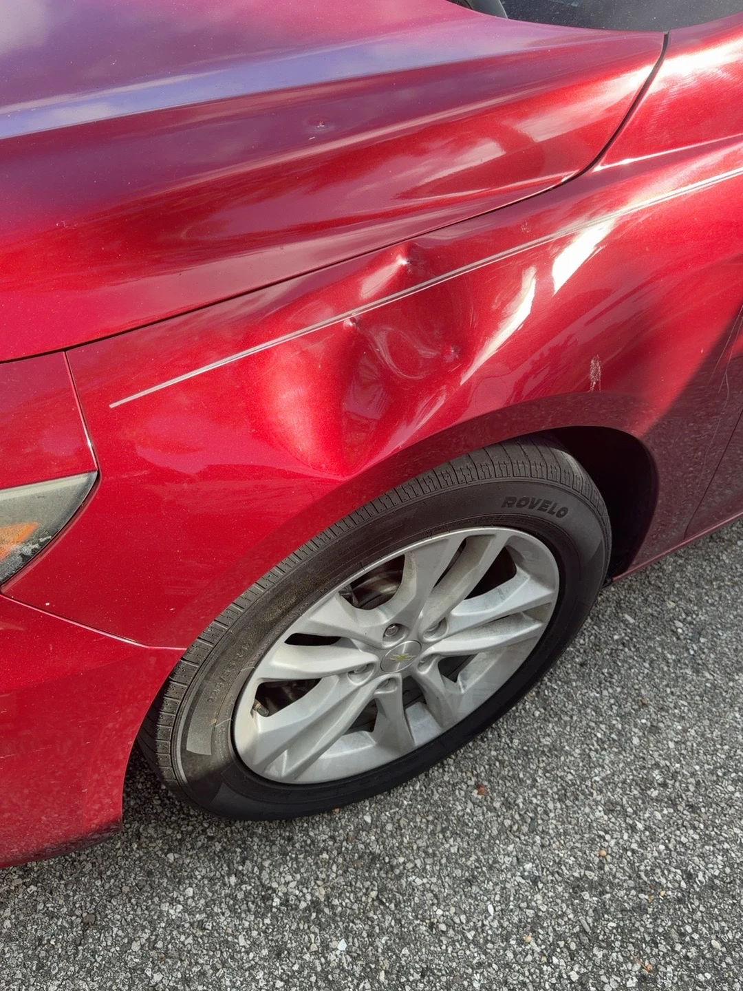 Front fender dent — detail